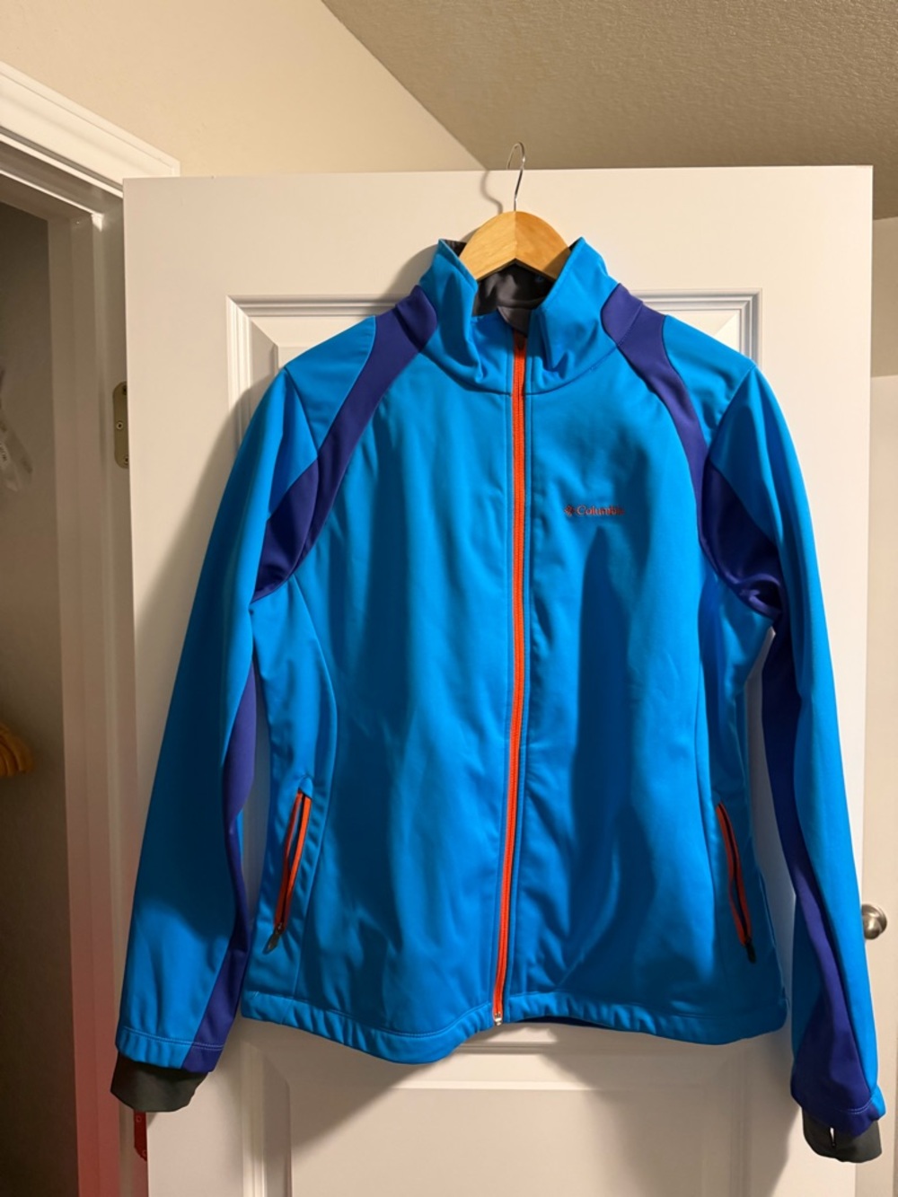Columbia Blue Ski Jacket with Purple Panels and Orange Zipper